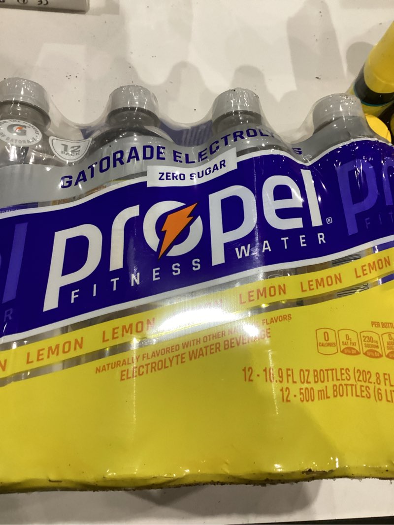 Condition photo showing New/Like New for Propel Electrolyte Enhanced Water Sports Drink, Lemon Flavored Water, Zero Calorie & Zero Sugar Hydration with Electrolytes and Vitamins C & E, 16.9 fl oz Bottles (12 Pack) Lemon 16.9 Fl Oz (Pack of 12)