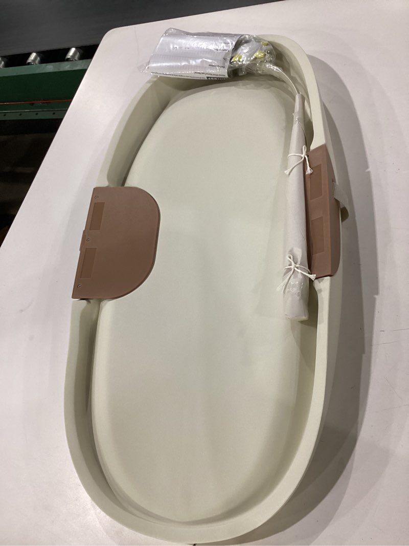 Condition photo showing As Is for *similar to stock* skip hop baby changing pad nursery style wipe-clean contoured with cushioned foam, non-skid base, built-in safety belt & tuck-away toy bar fits standard changing tables, oat 16\" oat
