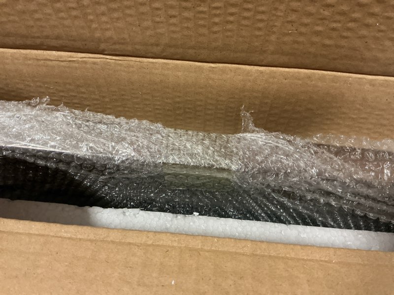 Condition photo showing New/Like New for Head West 29"x35" Pave Textured Beveled Framed Wall Mirror, Decorative Rectangular Wall Mirrors for Bathroom Sink, Bedroom, Living Room, and Entryway, Chrome