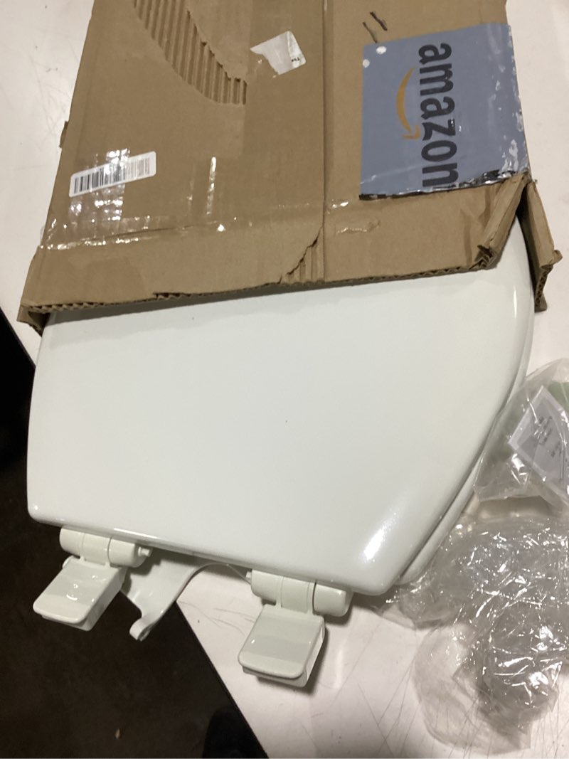 Condition photo showing Good Condition for Mayfair NextStep2 Slow-Close Toilet Seat with Built-In Toddler Potty Training Seat, Removable, White, Round Round 2-in-1 Toilet Seat