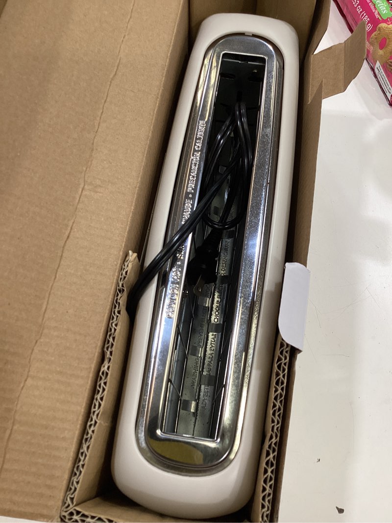 Condition photo showing New/Like New for bella 2 slice slim toaster, fits-anywhere™ kitchenware, 6 setting shade control with reheat & cancel buttons, fits sourdough, 10” long slot, anti jam & auto shutoff, 900 watt, oatmilk 2 slice oatmilk