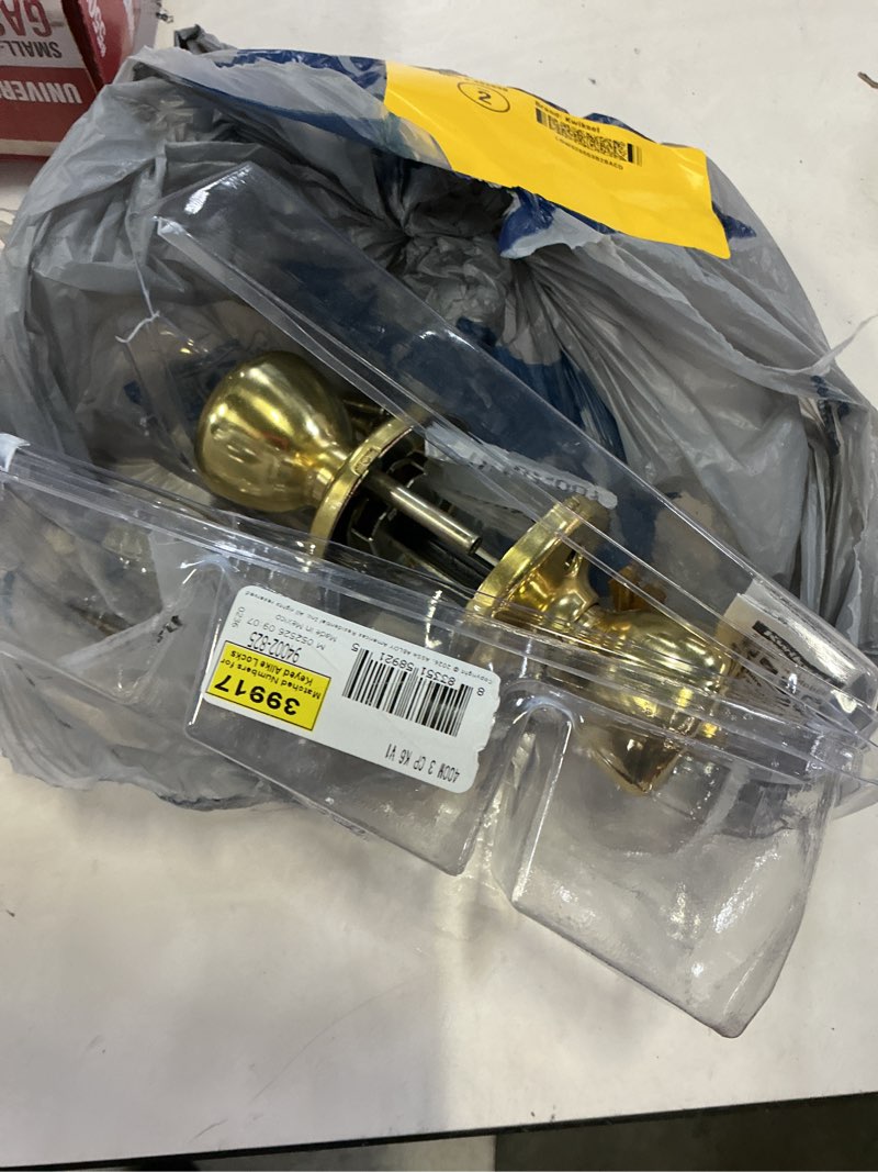 Condition photo showing As Is for kwikset mobile home tylo polished brass exterior no deadbolt keyed entry door knob with antimicrobial technology