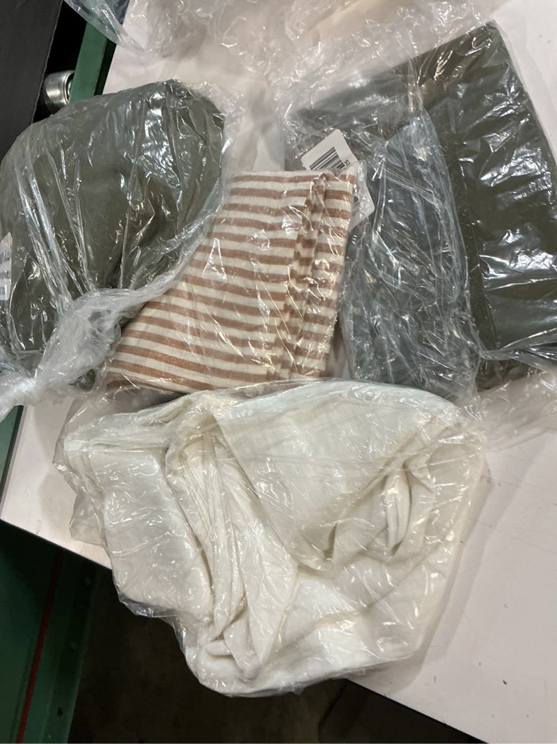 Condition photo showing Good Condition for variety of pillowcases (different sizes, colors and styles) brand quince