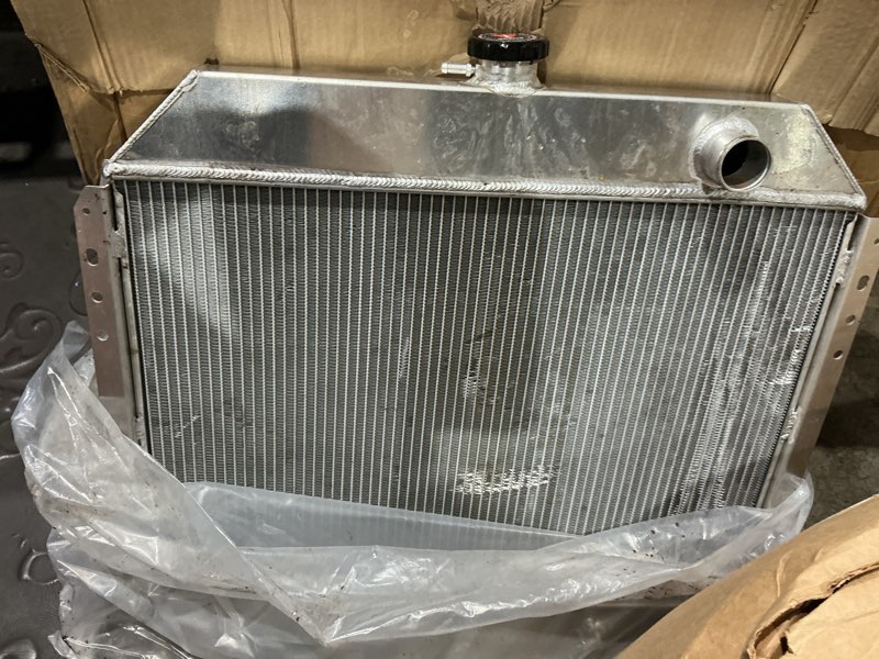 Condition photo showing As Is for 4 rows full aluminum radiator for ford f-series f100 f150 f250 truck bronco 66-79