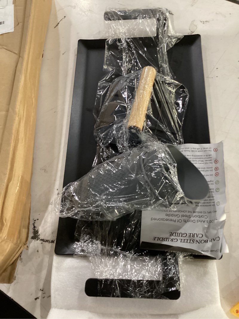 Condition photo showing Good Condition for universal large carbon steel griddle for outdoor gas grill, induction, gas/electric stove, and oven, double burner griddle comes with grill press, pre-seasoned nitride coating process large(comes with grill press)