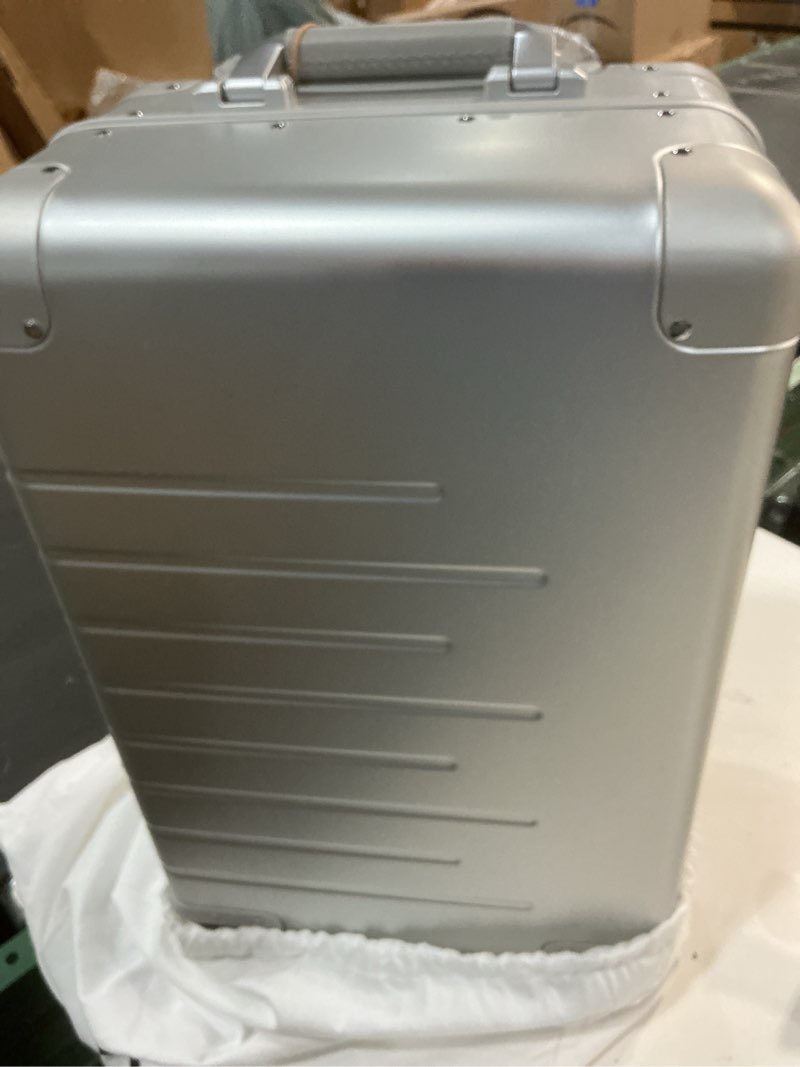 Condition photo showing As Is for (FRAYING ON THE ZIPPERS)Aluminium Small Carry-On Suitcase, 