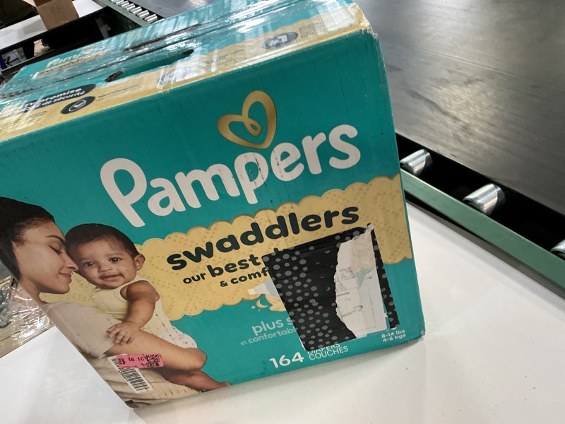 Condition photo showing New/Like New for pampers swaddlers diapers, size 1 (8-14 lbs), 164 count, absorbent, keeps baby dry and comfortable, skin safe disposable baby diaper size 1 164