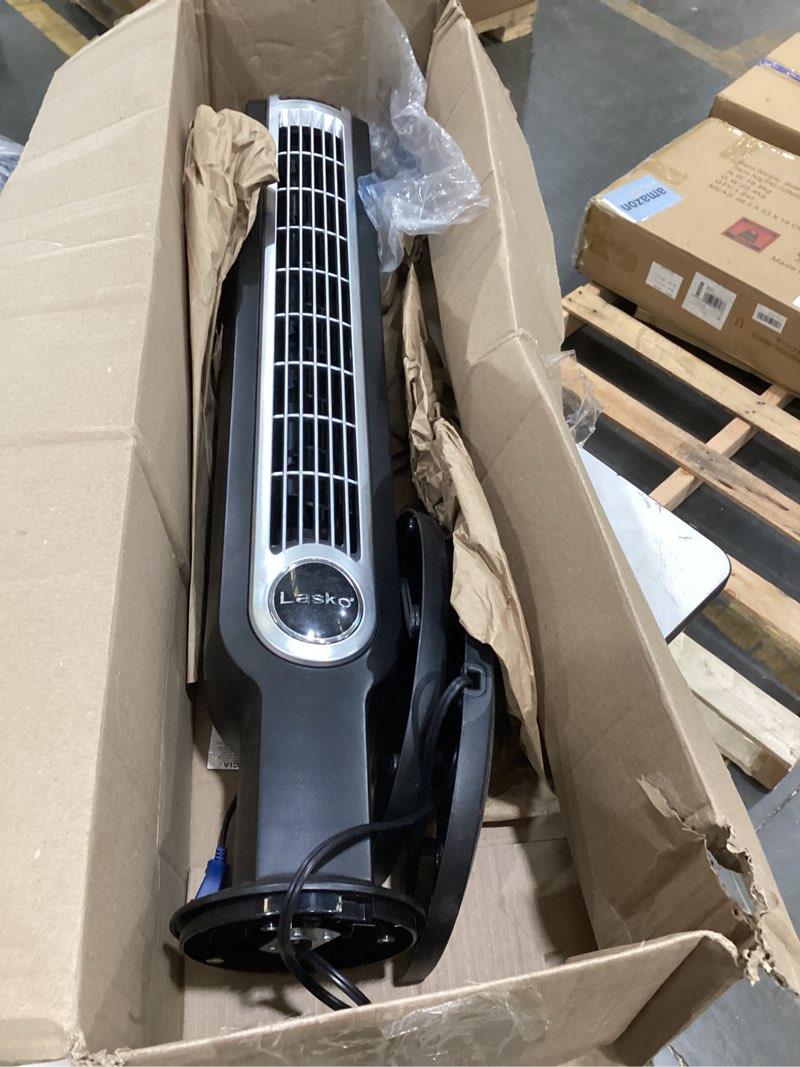 Condition photo showing Good Condition for lasko oscillating tower fan with remote, quiet floor fans for bedroom, 42", woodgrain and grey, t42954