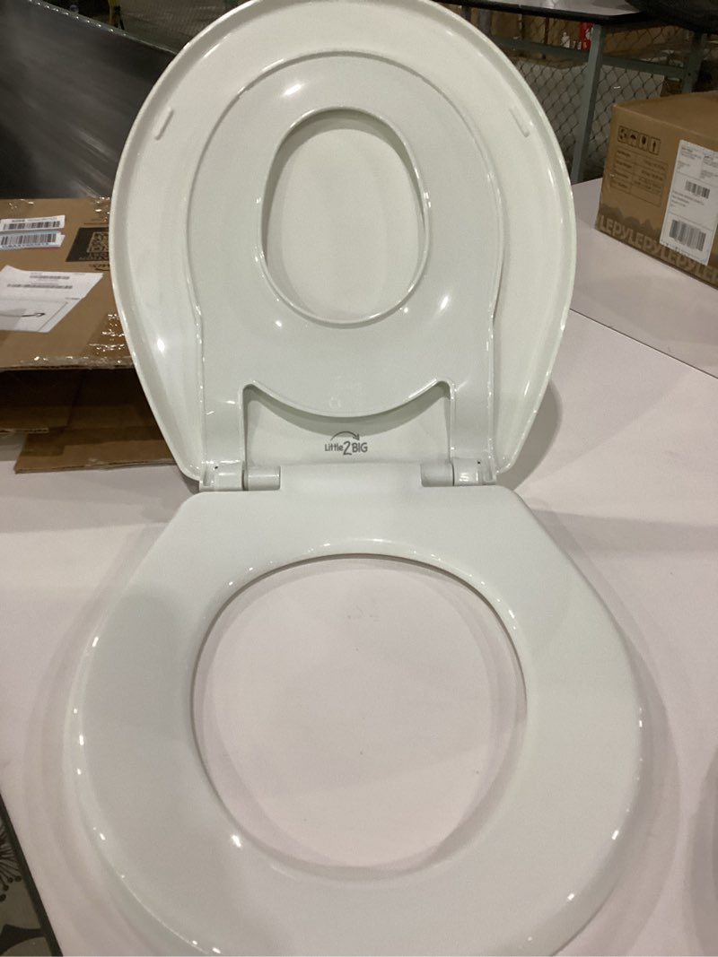 Condition photo showing Good Condition for little2big toilet seat with built-in potty training seat, slow close, durable plastic, made in usa, round, white