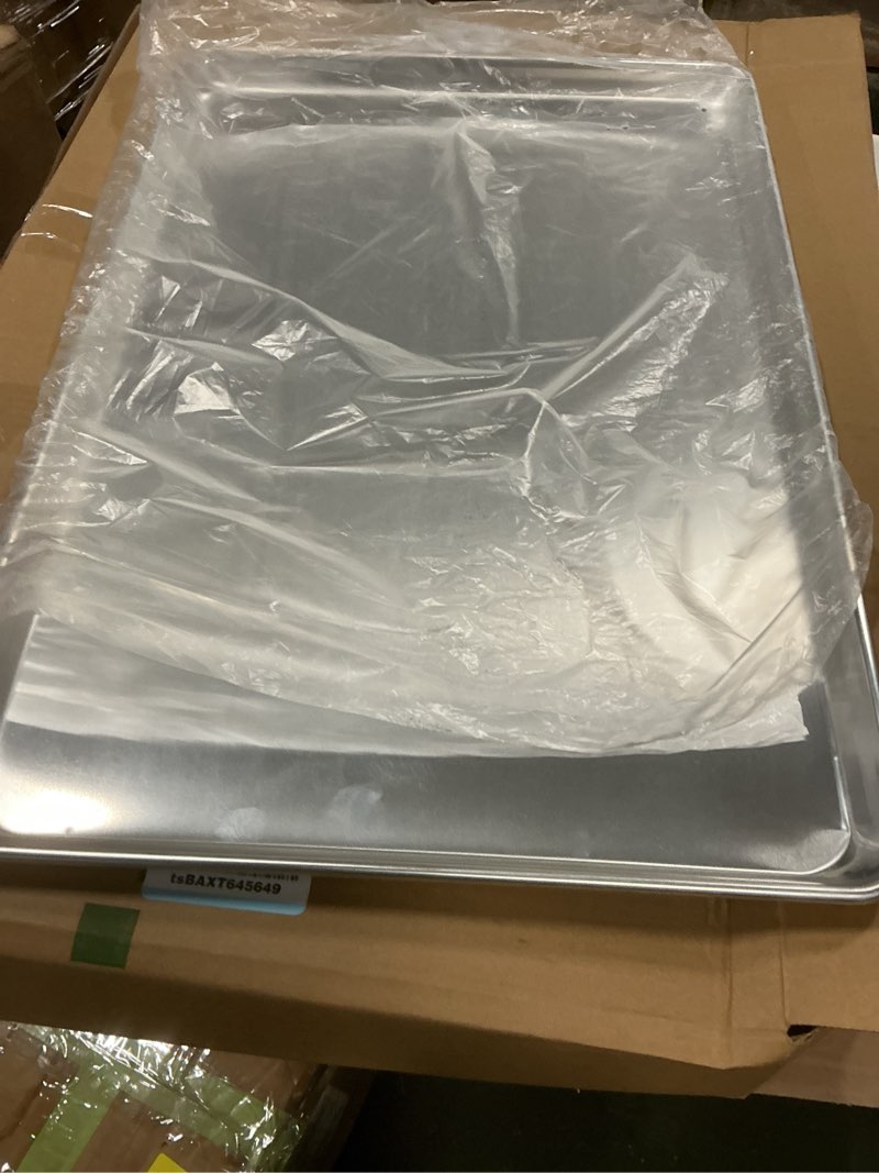 Condition photo showing Good Condition for Restaurantware Met Lux 26 x 18 Inch Industrial Baking Pan 1 Heavy-Duty Full-Size Bakery Sheet Pan - Rimmed Edges Endures Up To 392F Aluminum Sheet Pan Dishwashable Ideal For Baking Or Roasting