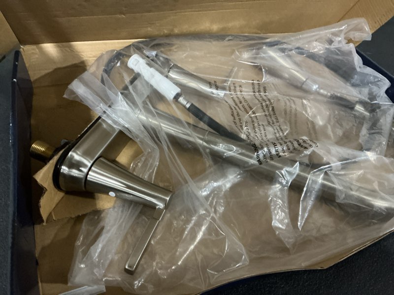 Condition photo showing As Is for project source stainless steel double handle deck-mount pull-out kitchen faucet with sprayer