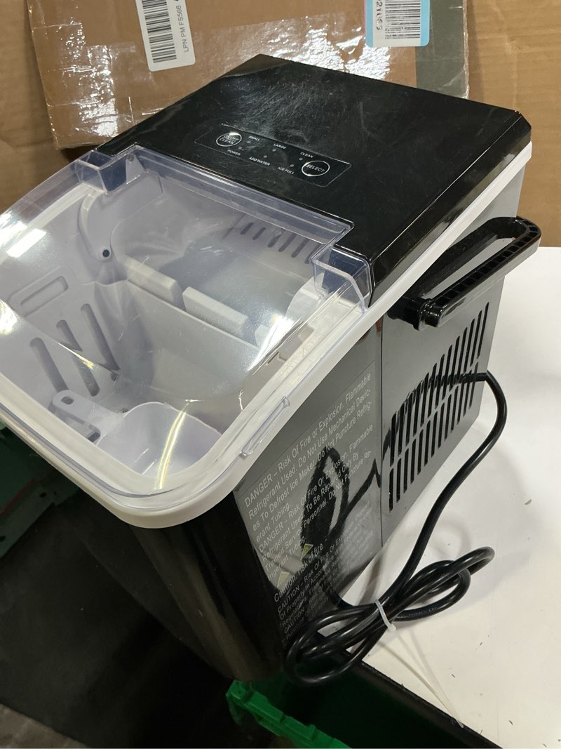 Condition photo showing As Is for COWSAR 26-lb Ice Per day Bullet Ice Maker ( Black