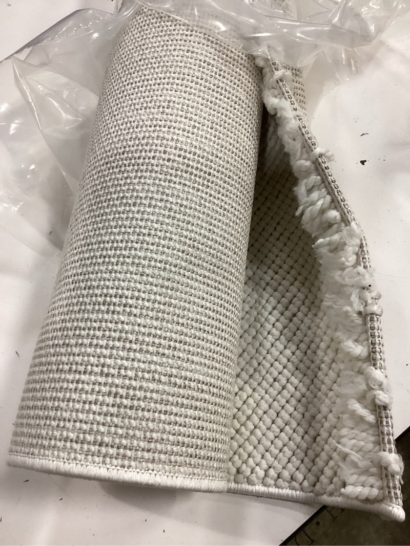 Condition photo showing Good Condition for luxe weavers solid machine woven cream 2x8 area rug, indoor stain-resistant carpet cream 2' x 8' (rectangular)