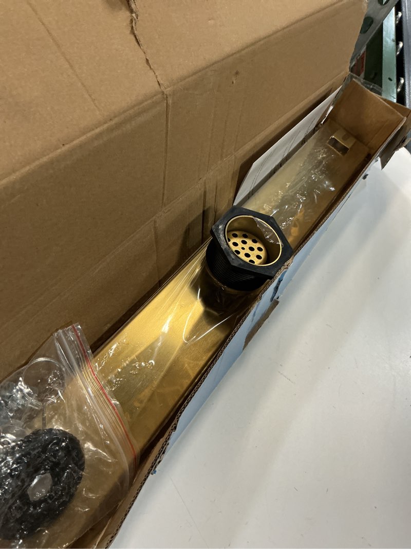 Condition photo showing Good Condition for sanitemodar linear shower drain, gold shower drain 24 inch with 2 in 1 tile insert and flat panel, aisi 304 stainless steel gold linear shower floor drain with hair strainer and leveling feet gold tile insert grate 24 inch