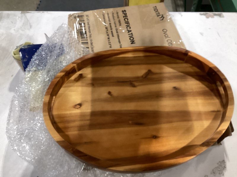 Condition photo showing As Is for Acacia Wood Ottoman Tray with Handles - 20" x 15" Round - Large Oval Serving Trays for Living Room -Wooden Trays for Decorative for Kitchen Counter, Coffee Table, Breakfast in Bed (Acacia) Acacia 20" x 15" x 2.2"