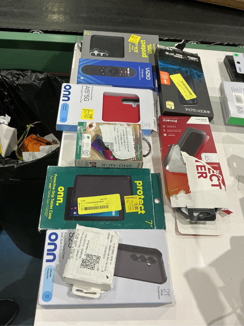Condition photo showing As Is for assorted cellphone/tablet/laptop case covers & accessories