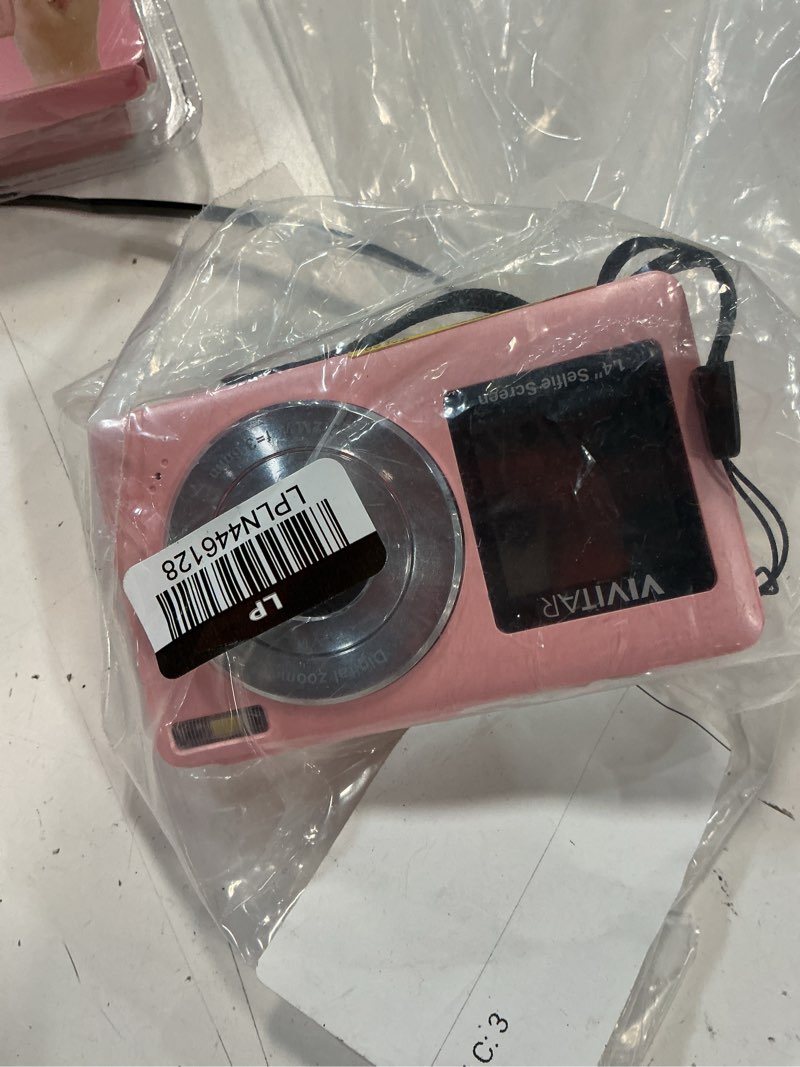 Condition photo showing As Is for vivitar snapshot duo digital camera - petal pink