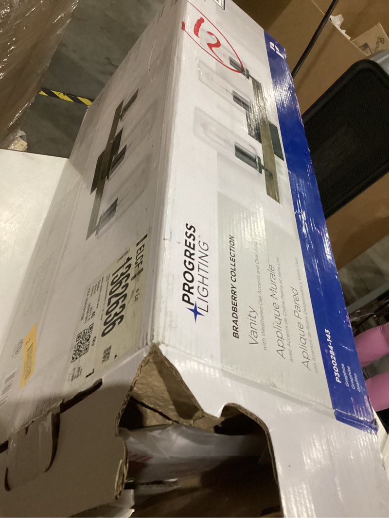 Condition photo showing As Is for Progress Lighting Bradberry 24-in 3 Light Brown Farmhouse Bathroom Vanity light