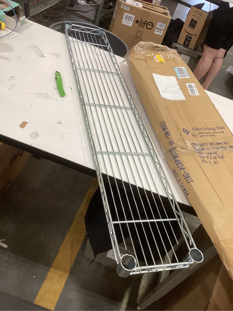 Condition photo showing As Is for shelving inc. 8" d x 48" w chrome wire shelving with 3 tier shelves, weight capacity 800lbs per shelf 8" d x 48" w x 34" h