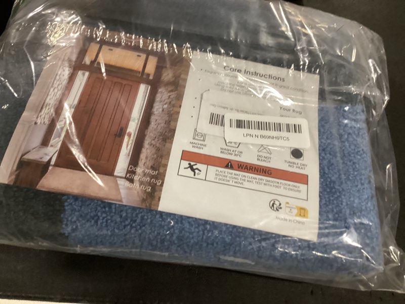 Condition photo showing New/Like New for machine washable throw rug 24" x 36", non slip kitchen mat for floor, absorbent entryway rug for kitchen, bathroom, door 24" x 36" navy blue