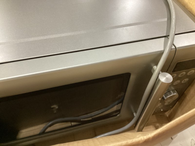 Condition photo showing As Is for not tested!!!breville bmo650sil compact wave soft close countertop microwave oven, silver