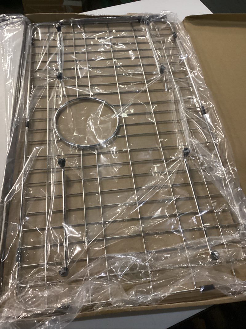 Condition photo showing New/Like New for stainless steel sink grid and protectors for bottom of kitchen sink, 26" x 14 1/16" sink bottom grid with rear drain for single sink bowl (26" x 14 1/16") 26" x 14 1/16" rear drain