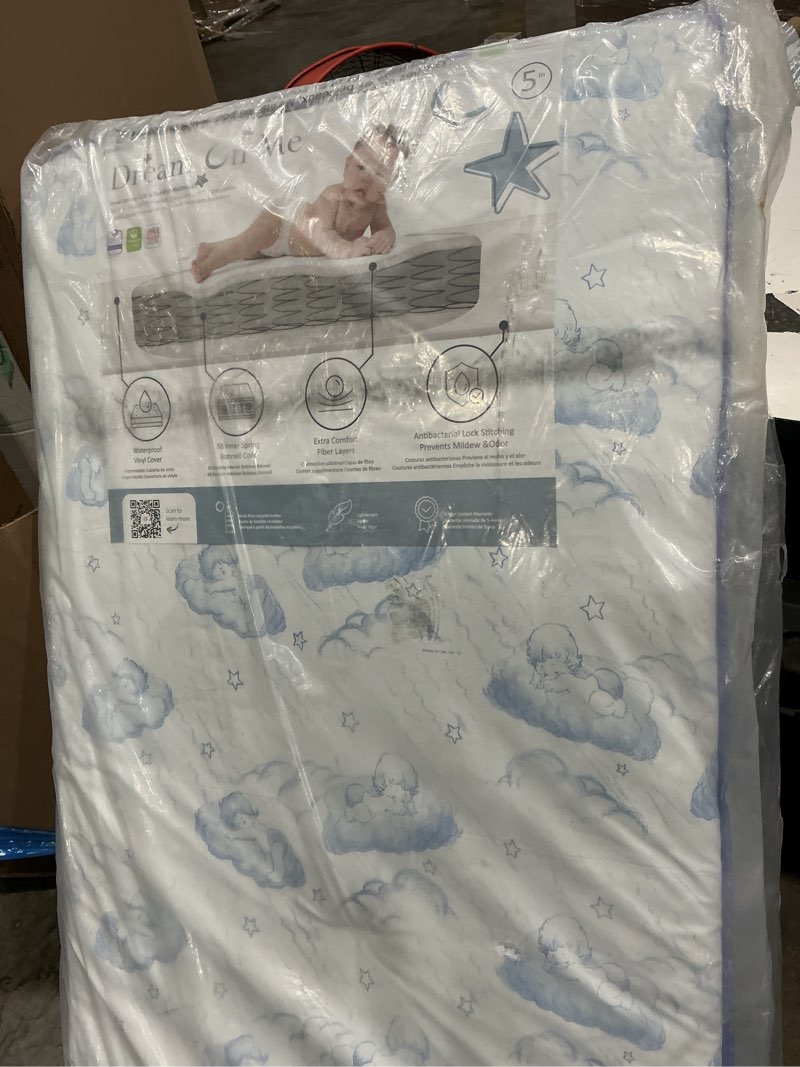 Condition photo showing Good Condition for dream on me nap nest crib and toddler mattress, blue cloud