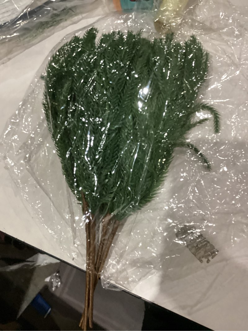 Condition photo showing Good Condition for Real Touch Christmas Norfolk Pine Branches -18" Artificial Pine Branches Green Plants Branches for Holiday Floral Arrangements, Wreaths, Craft DIY and Home Xmas Decorations (4PCS(24 sprigs))