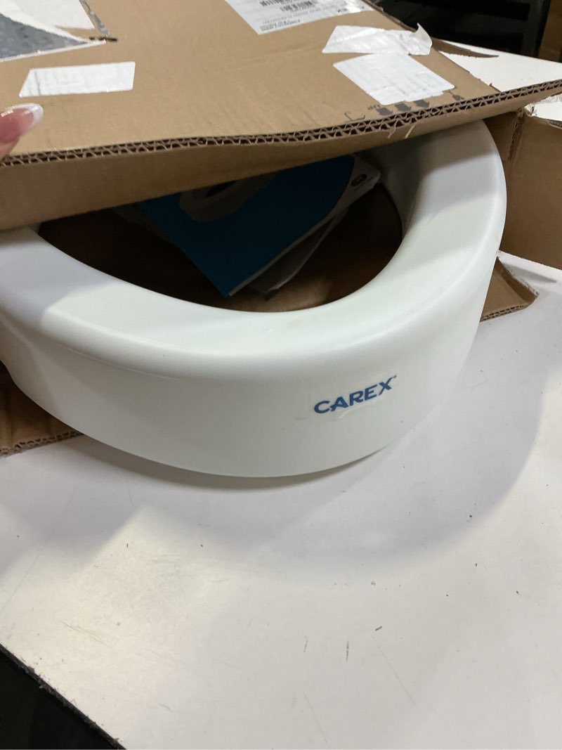 Condition photo showing As Is for carex elongated hinged toilet seat riser, adds 3.5 inches of height to toilet, 300 pound weight capacity, raised toilet seat