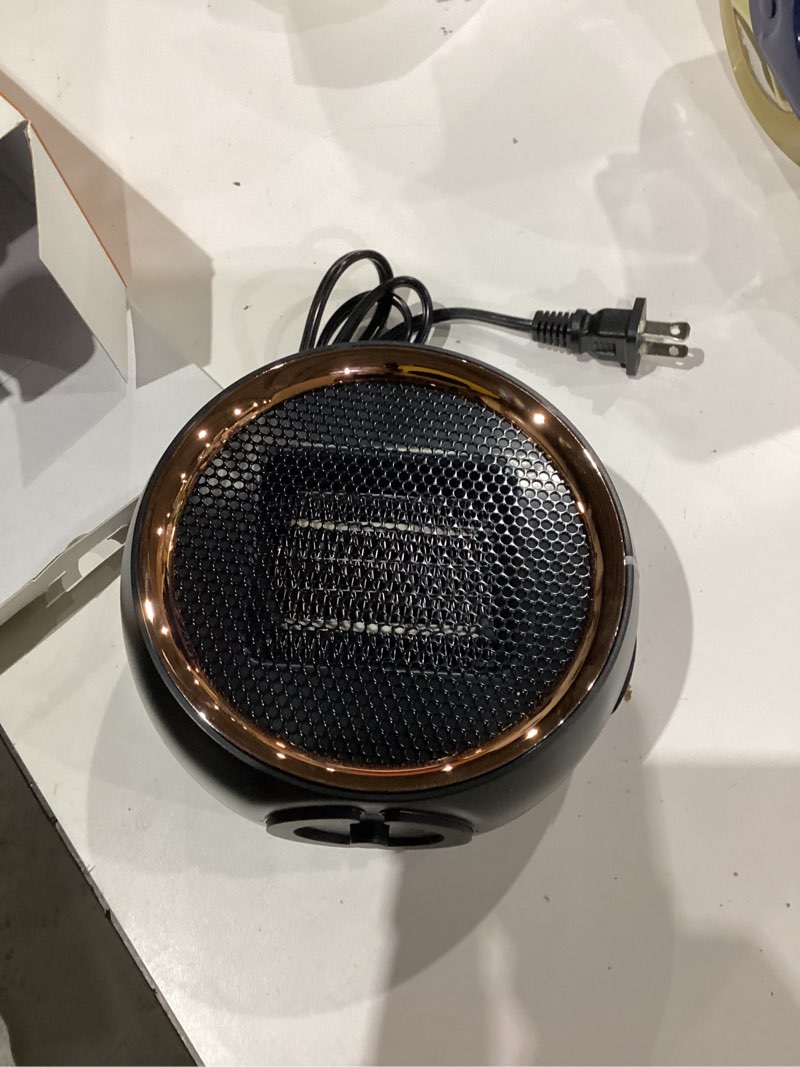 Condition photo showing As Is for Space Heater, Portable Electric 500W PTC Ceramic Heaters for Indoor Use, Efficient Fast Heating, Tip-Over & Overheat Protection, Quiet Small Mini Desk Heater for Bathroom Home Office Bedroom Black