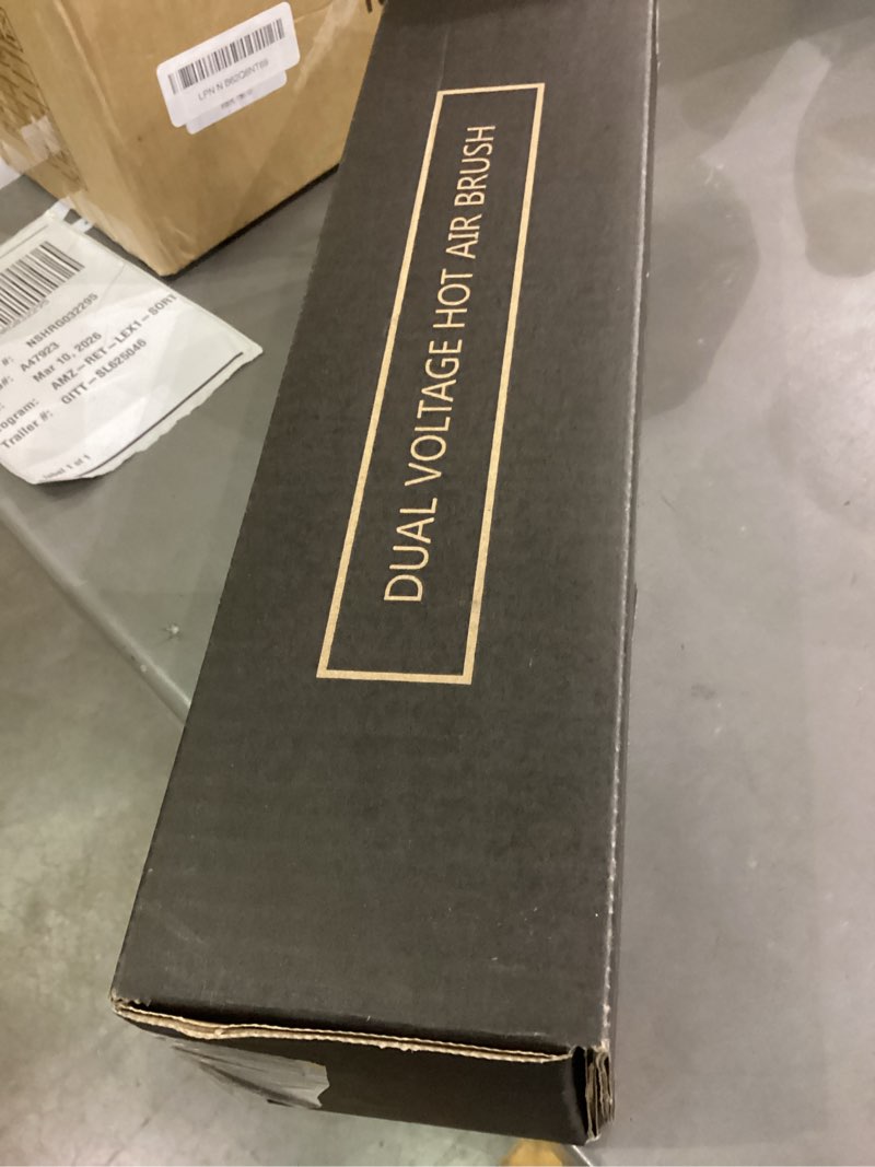 Condition photo showing New/Like New for Dual voltage hot hair brush