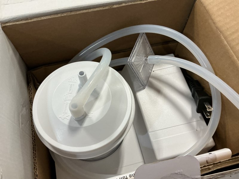 Condition photo showing As Is for portable veterinary suction machine home use with 1000ml capacity 110v