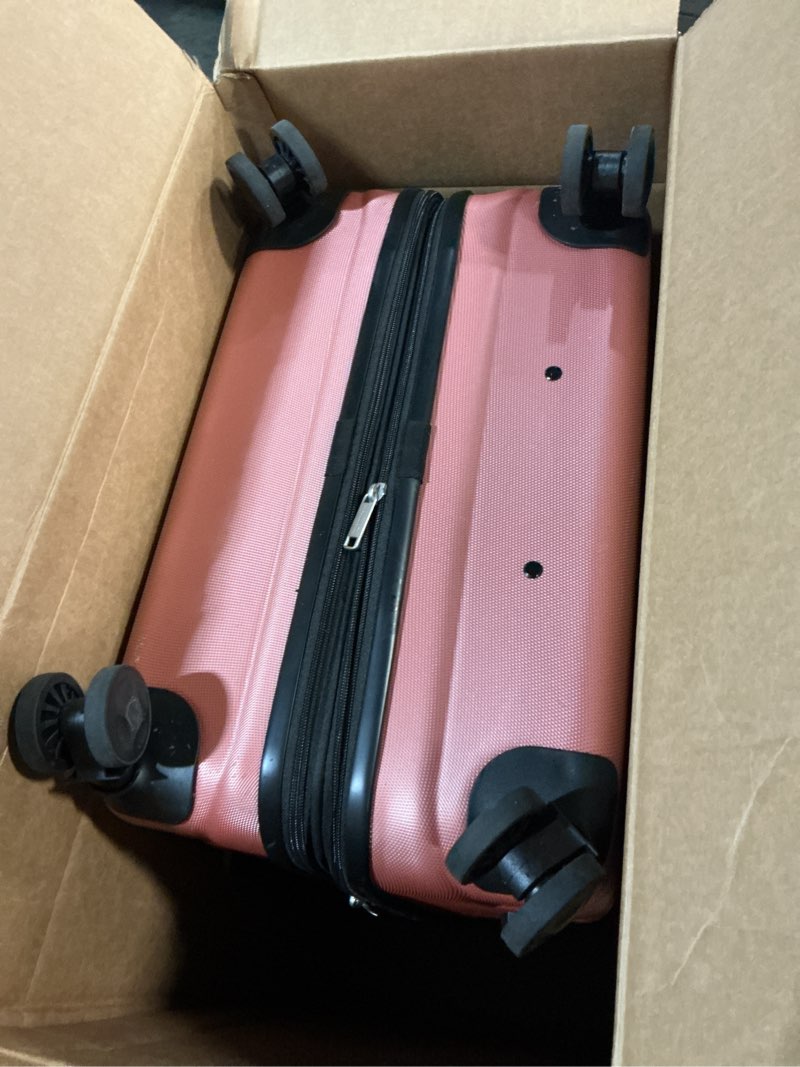 Condition photo showing As Is for Amazon Basics 30" Hardside Large Checked Luggage, Hardshell Suitcase With Wheels, Expandable For Up to 15% More Space, With Scratch-Resistant Surface, Four Multi-directional Wheels, Rose Gold Rose Gold Large Checked