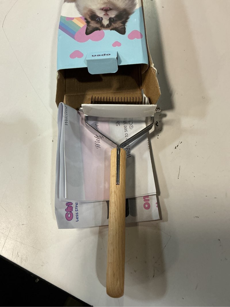 Condition photo showing Good Condition for cat brush for long haired cats - double sided dematting undercoat rake for persian, ragdoll, maine coon - professional grooming tool to remove mats, tangles & shedding - skin-safe teeth