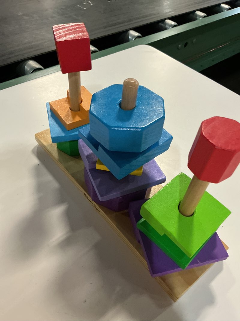 Condition photo showing Good Condition for melissa and doug geometric stacker toddler toy 