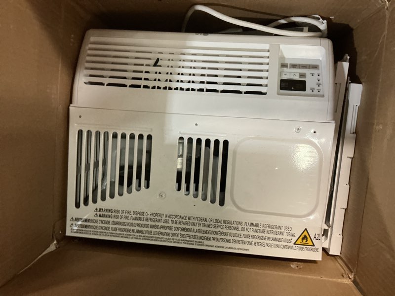 Condition photo showing Good Condition for lg 6,000 btu window air conditioner, 115v, cools 250 sq.ft. for bedroom, den, living room, quiet operation, with remote, 2 cooling & fan speeds, 2-way air deflection, auto restart, white 6000 btu electronic & standard white