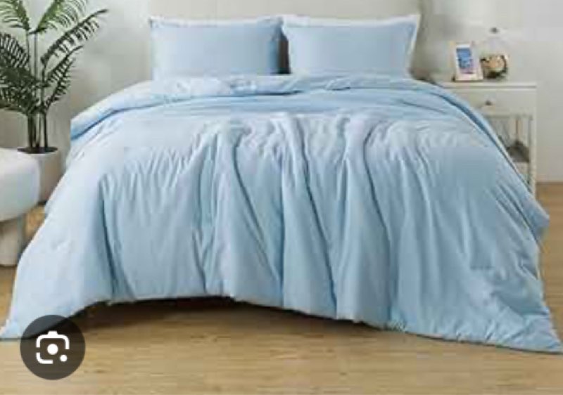 KOZYHVN Twin size light blue comforter (similar to stock photo)