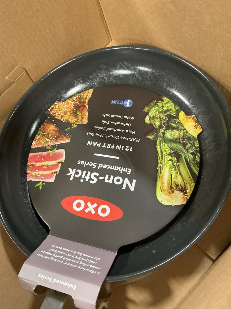 Condition photo showing As Is for oxo enhanced 12" frying pan skillet, pfas-free ceramic nonstick, durable hard anodized cookware, scratch resistant, stainless steel handle, good grips, dishwasher & oven safe, black black 12" frying pan skillet