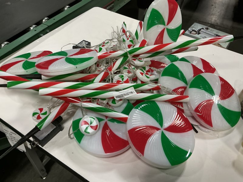 Condition photo showing As Is for 6 Pack Christmas Lollipop Pathway Lights Outdoor with 28PC Candy, 27" 176LED Peppermint Candy Cane Decoration with 8 Mode&Timer&Stake, Pathway Marker Light for Walkway Outsides Decor(Red,Green, White)