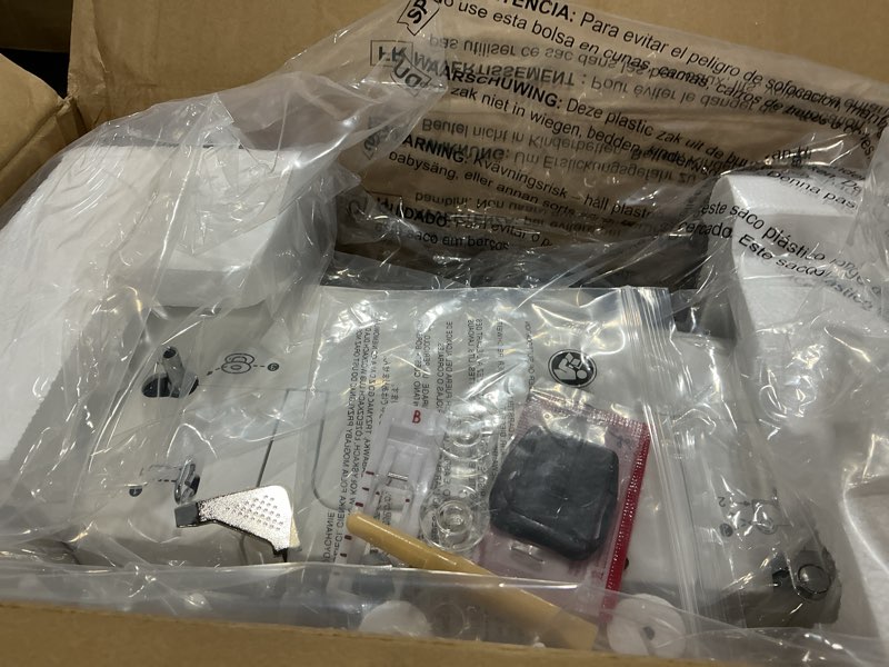 Condition photo showing As Is for SINGER M1500 Lightweight & Portable Sewing Machine with Accessory Kit | 57 Stitch Applications, LED Light & 4-step Buttonhole | Great for Quilting, Crafts & Mending