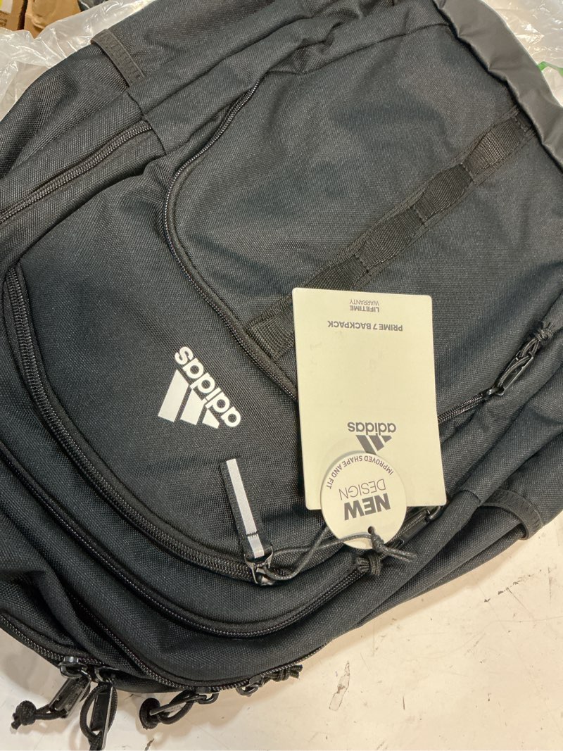 Condition photo showing New/Like New for adidas prime backpack for work, travel bag for women and men with padded compartment for laptop black/white/2 one size