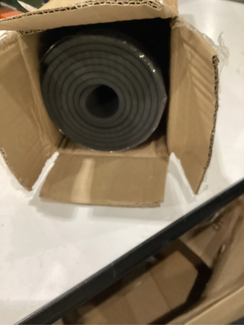 Condition photo showing New/Like New for amazon basics 1/4 inch thick tpe exercise yoga mat with carrying strap