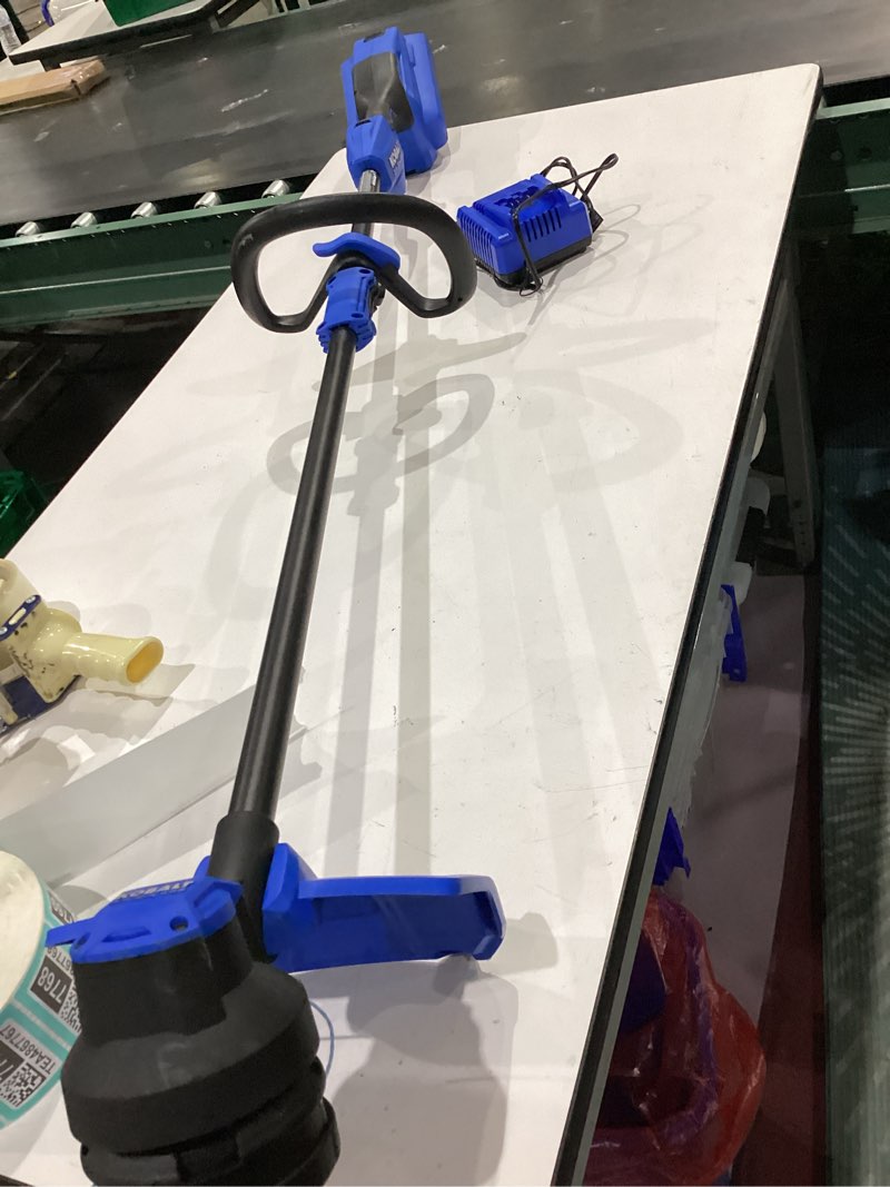 Condition photo showing As Is for kobalt quiet tech 24-volt 15-in straight shaft battery string trimmer 4 ah (battery included) (charger included)