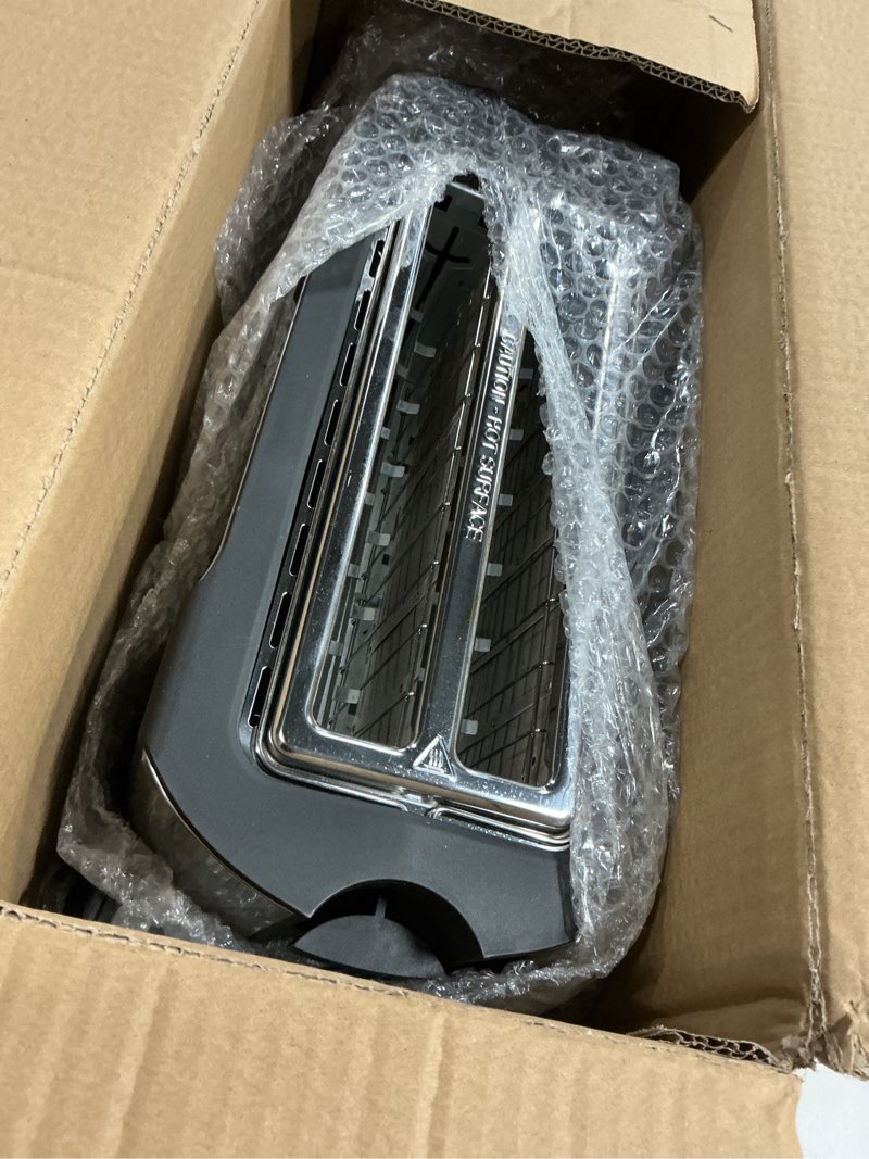 Condition photo showing As Is for Elite Gourmet ECT-3100 Long Slot 4 Slice Toaster, Reheat, 6 Toast Settings, Defrost, Cancel Functions, Built-in Warming Rack, Extra Wide Slots for Bagels & Waffles, Stainless Steel & Black 4 Slice Matte Black