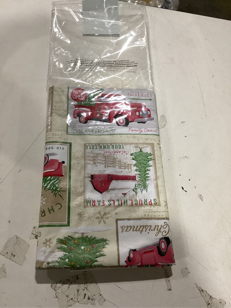 Condition photo showing As Is for Newbridge Yuletide Christmas Tree Farm Red Barn Truck Vinyl Flannel Back Tablecloth, 60 x 84 Inch Oval, Nostalgic Holiday Wipe Clean Easy Care Table Cover 84" x 60" (Oval) Yuletide Christmas Tree Farm