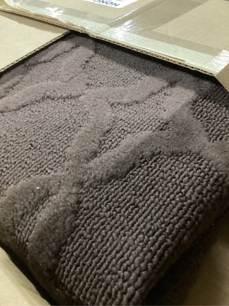 Condition photo showing Good Condition for garland rug sparta non slip polypropylene 5 ft. x 7 ft. brown mocha area rug- ideal for living rooms & hallways, stylish & durable for high-traffic areas mocha 5' x 7' (rectangular)
