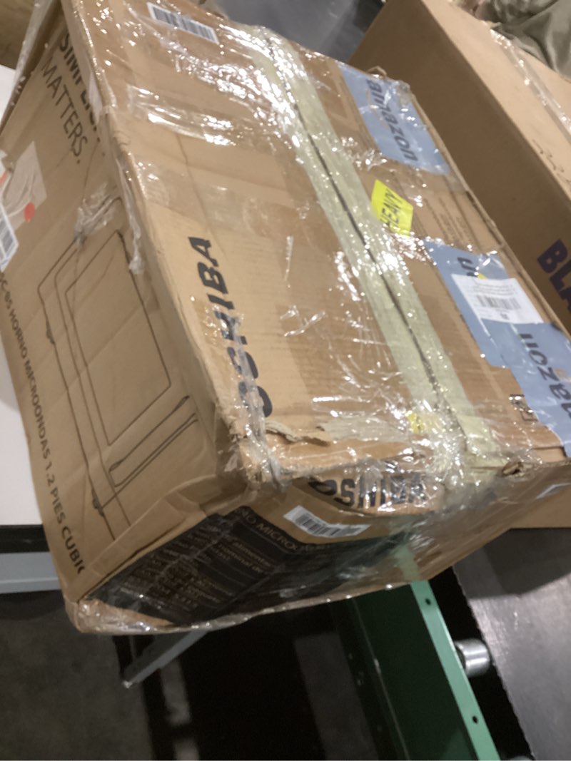 Condition photo showing As Is for TOSHIBA EM131A5C-BS Countertop Microwave Ovens 1.2 Cu Ft, 12.4" Removable Turntable Smart Humidity Sensor 12 Auto Menus Mute Function ECO Mode Easy Clean Interior Black Color 1000W 1.2 Cu.ft