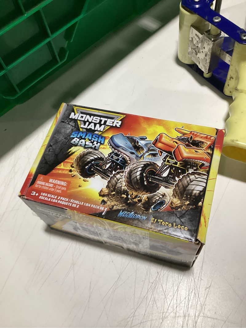 Condition photo showing Good Condition for Monster Jam Smash & Bash 2-Pack Monster Trucks, Megalodon & El Toro Loco, 1:64 Die Cast Repairable M