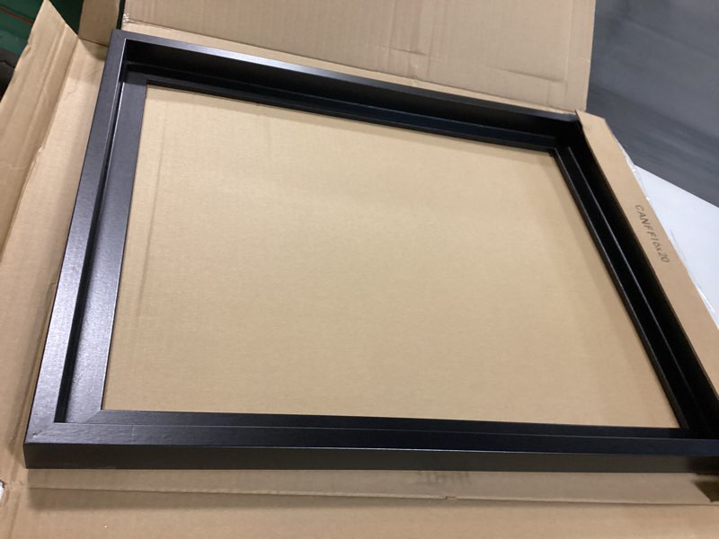 Condition photo showing Good Condition for Americanflat 16x20 Canvas Floating Frame with Adhesive Strips Included - Vertical and Horizontal Floating Frame for Artwork - Canvas Frames for Wall Display - Black Black 16X20