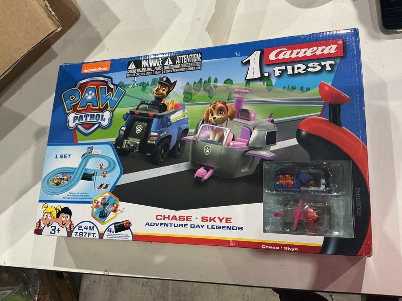 Condition photo showing New/Like New for carrera first paw patrol - slot car race track - includes 2 cars: chase and skye - battery-powered beginner racing set for kids ages 3 years and up,
